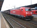 DB 185 030-4 pulls a train of autoracks through Homburg Hauptbahnhof
